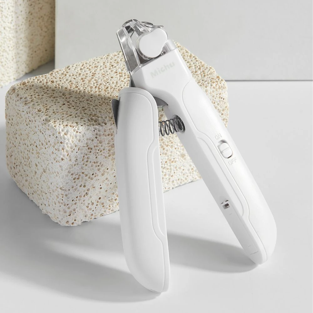 98_5bf7555c-c993-40b2-aefc-5e4ff88bcf77_2000x.webp Michu LED Pet Nail Clipper - Image 1