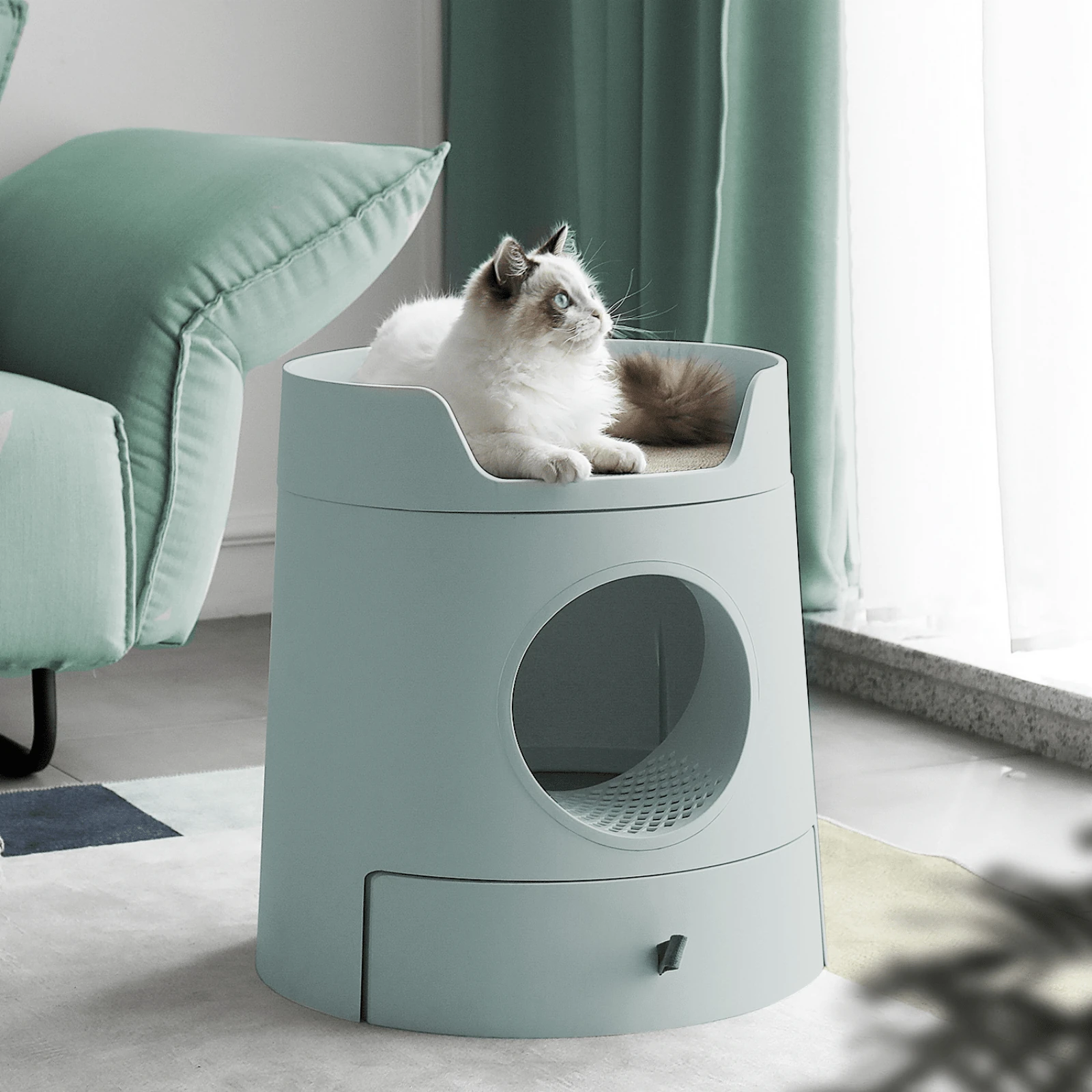 bowl stand near designer cat castle litter box